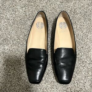 Black leather flats